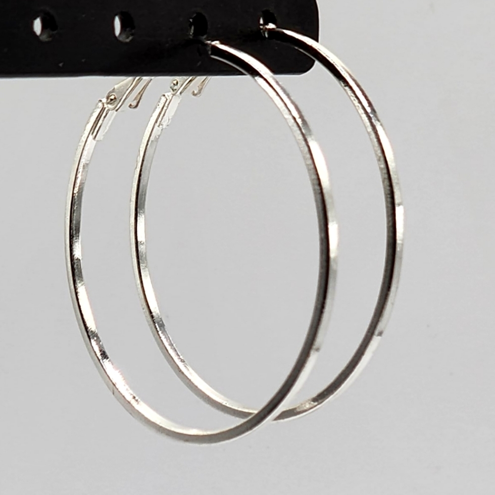 Silver tone hoop earrings